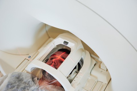 Person in a CT scanning machine