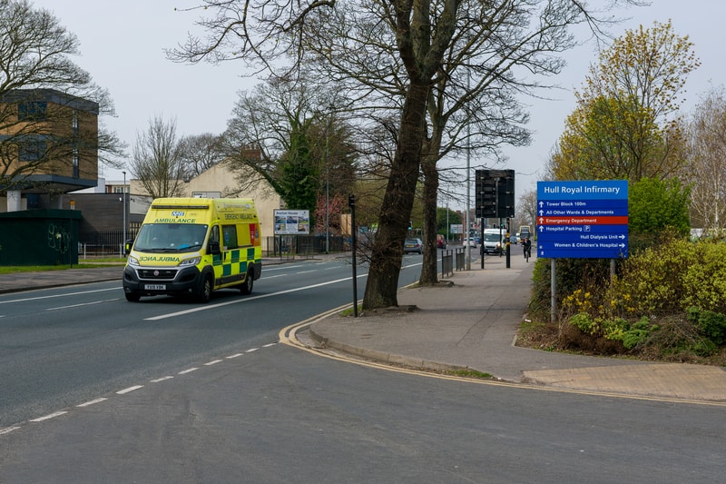 Ambulance driving in front of Hull Royal Infirmary