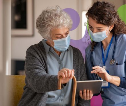 Decorative image of an older person and a medical professional look at an iPad. Image acts as a link to information about the Partnership.