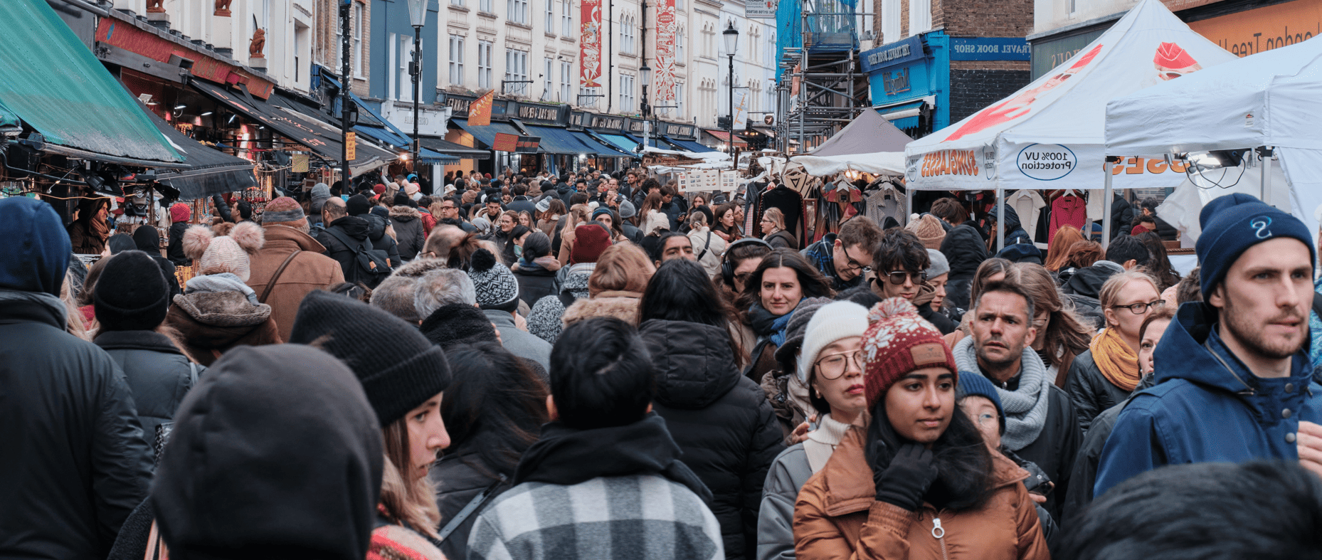 People walking in busy streets. All different ages and ethnicities. crowded streets. over populated.