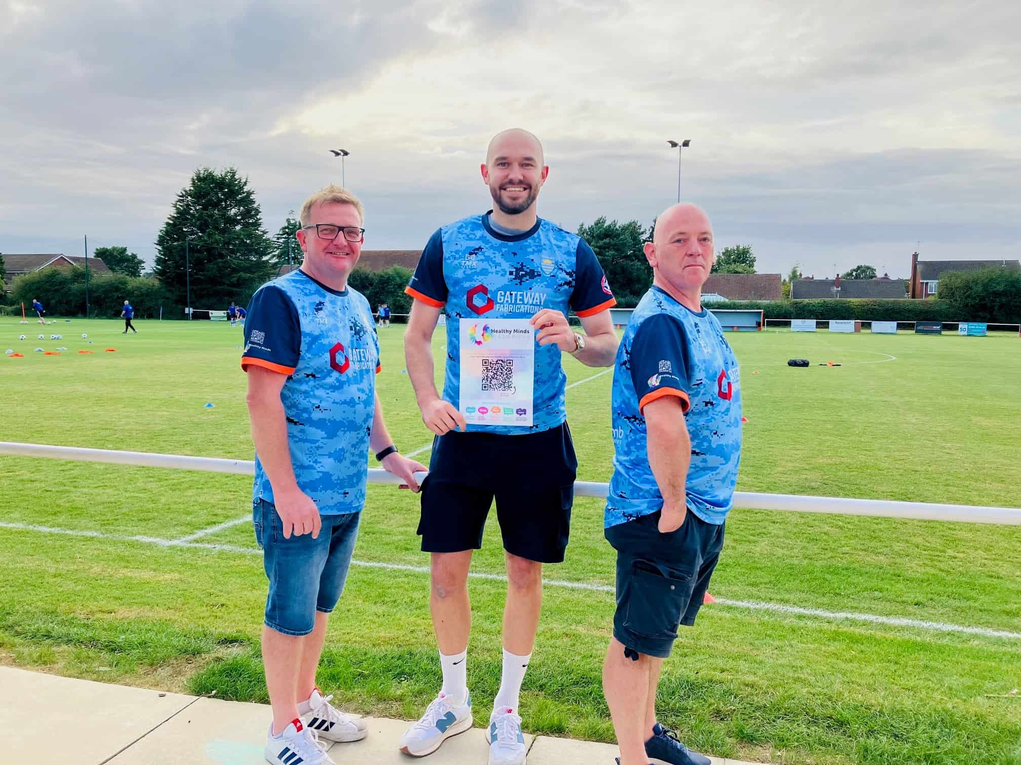 Players from Beverley Town football club showing off their new kits, which are helping to promote Healthy Minds