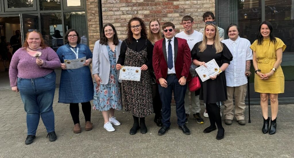 Some of the young people from'Nothing About Us Without Us' advisory group pose for a group photo after picking up awards for their work and influence