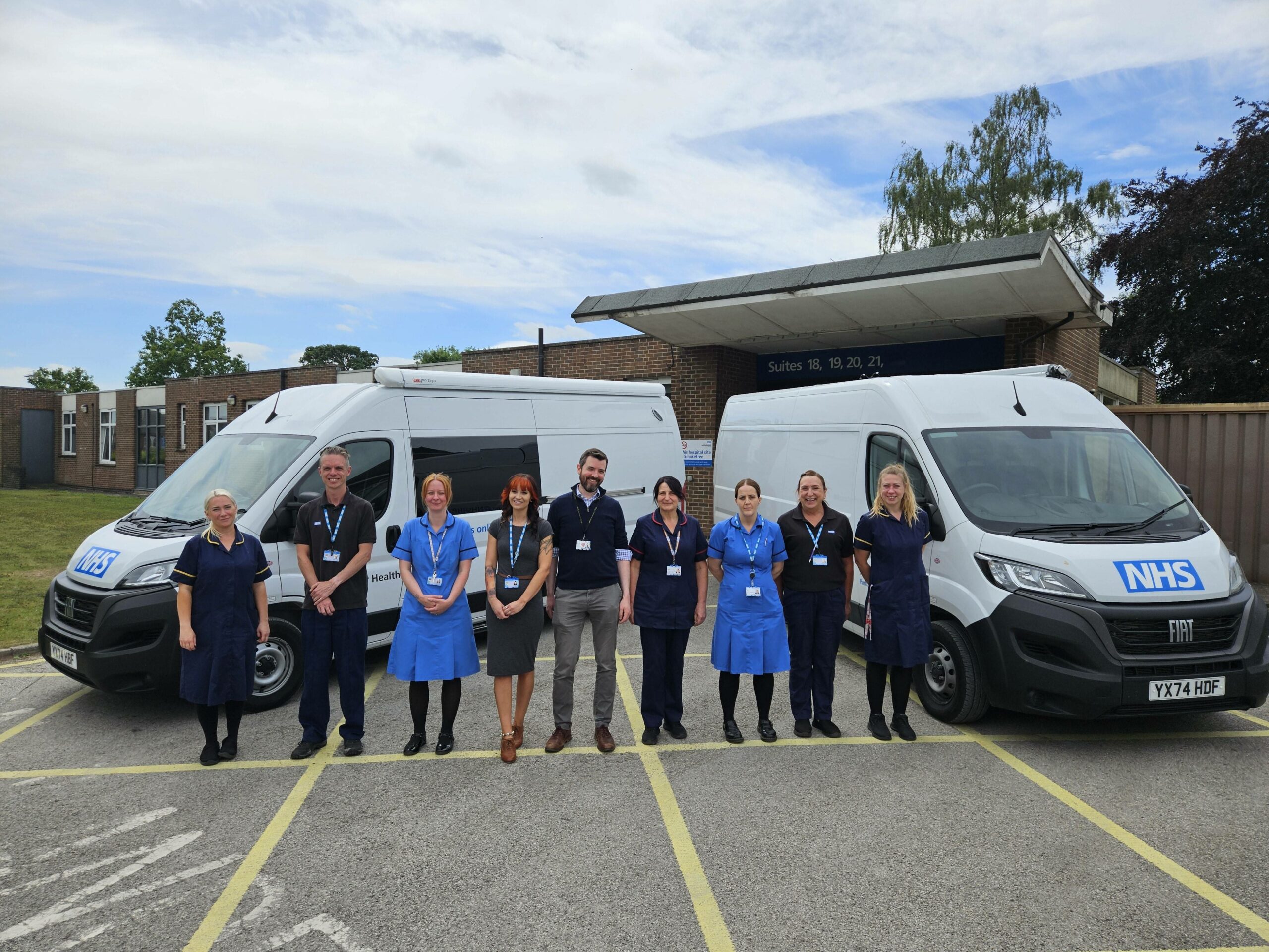 Hep C Screening team with new clinic vans
